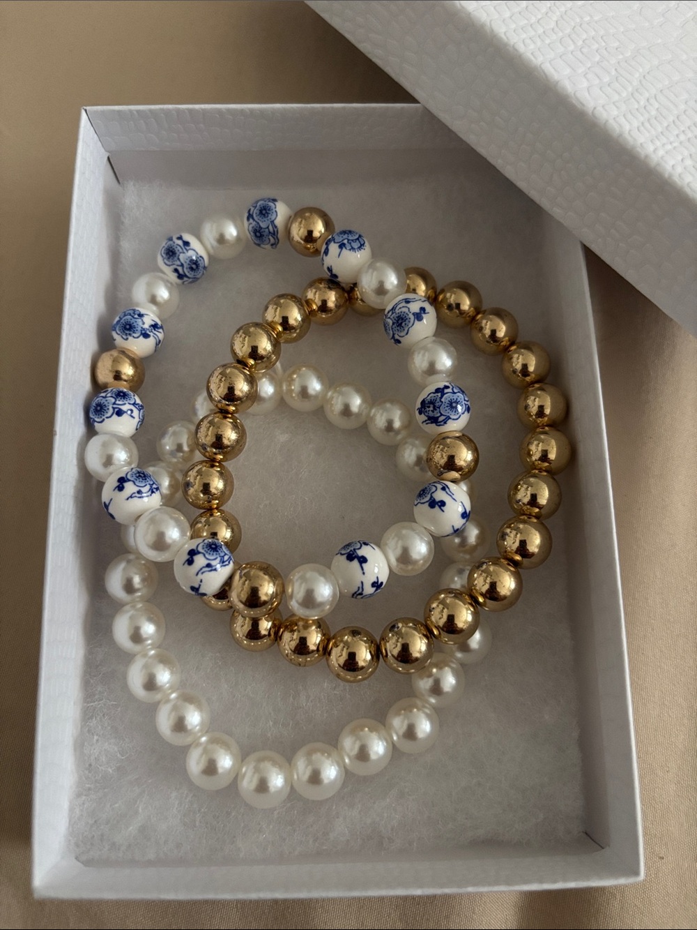 3 Elegant Pearl & Gold Bead Bracelet Set with Blue Floral Accent